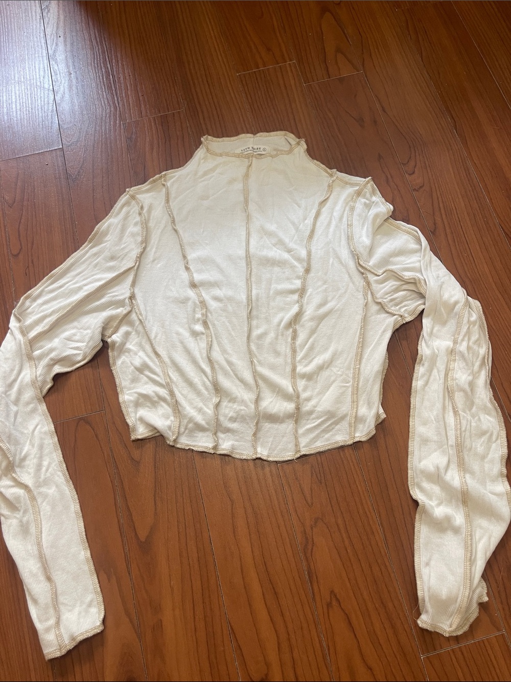 12th Tribe Cream Cropped Long-Sleeve Seam-Detail Top